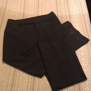 Dark gray dress pants.